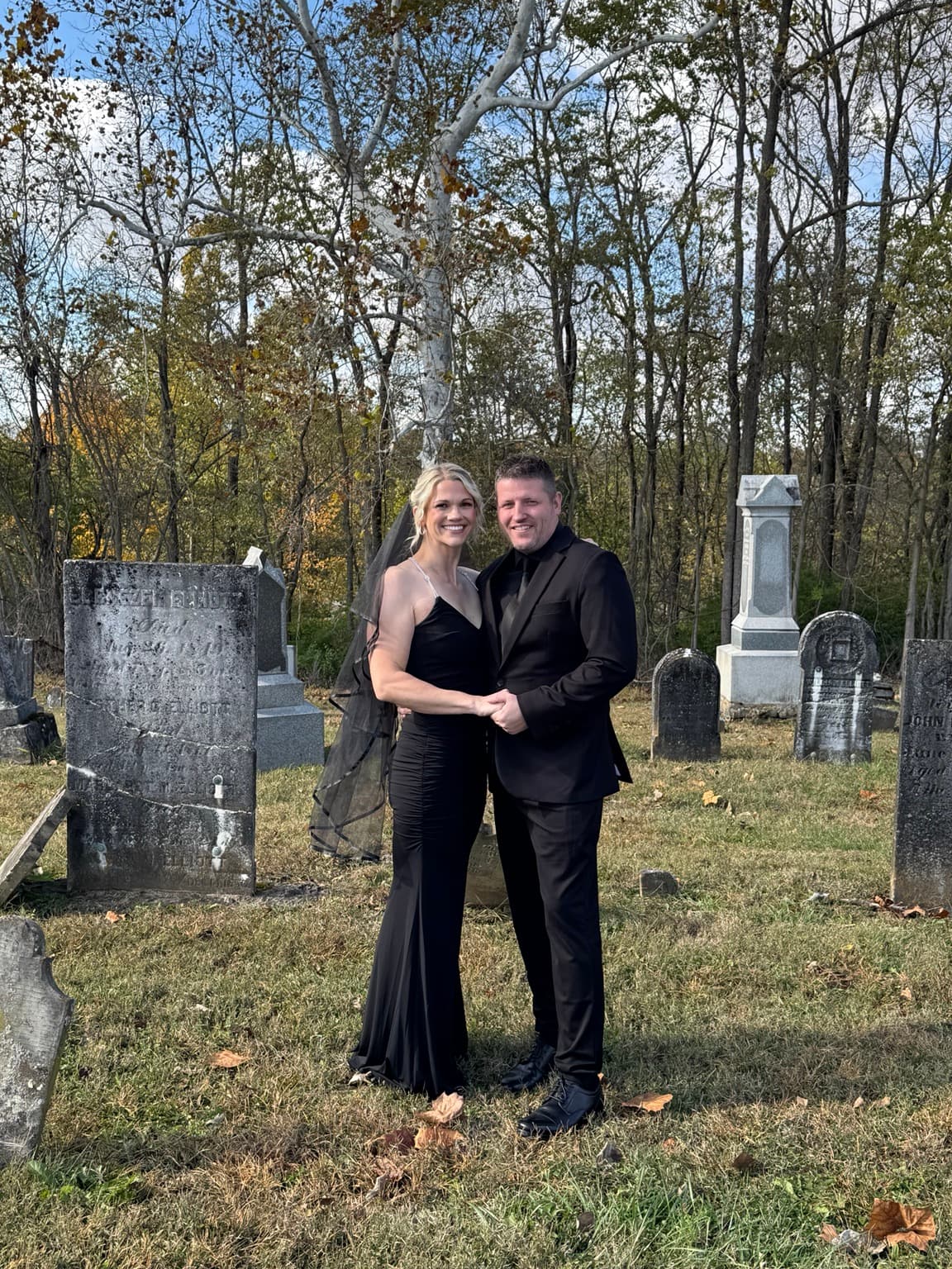 Doug and Rachel on their wedding day in a cemetery